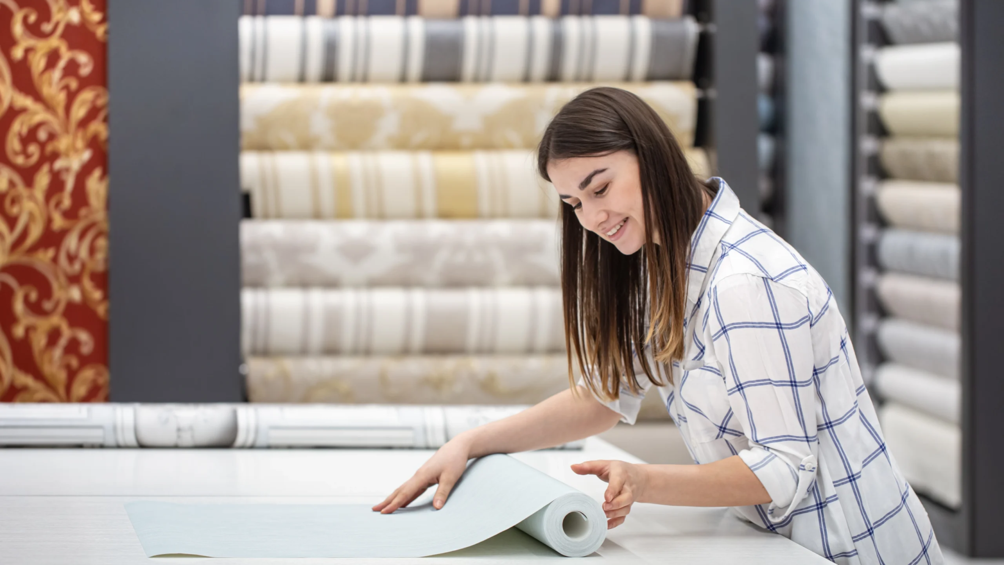 young-woman-store-chooses-wallpaper-her-home-concept-repair-shopping